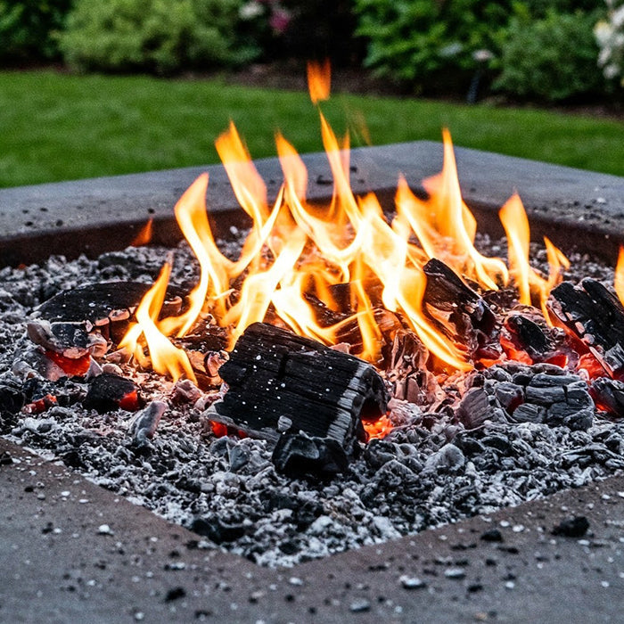 Burning fire pit with ashes