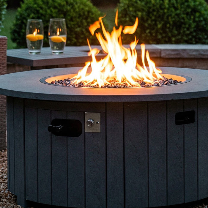 Round_gas_fire_pit_burning.