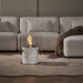EcoSmart Fire Pillar 3L - Italian Carrara White Marble Finish In Lounge Setting