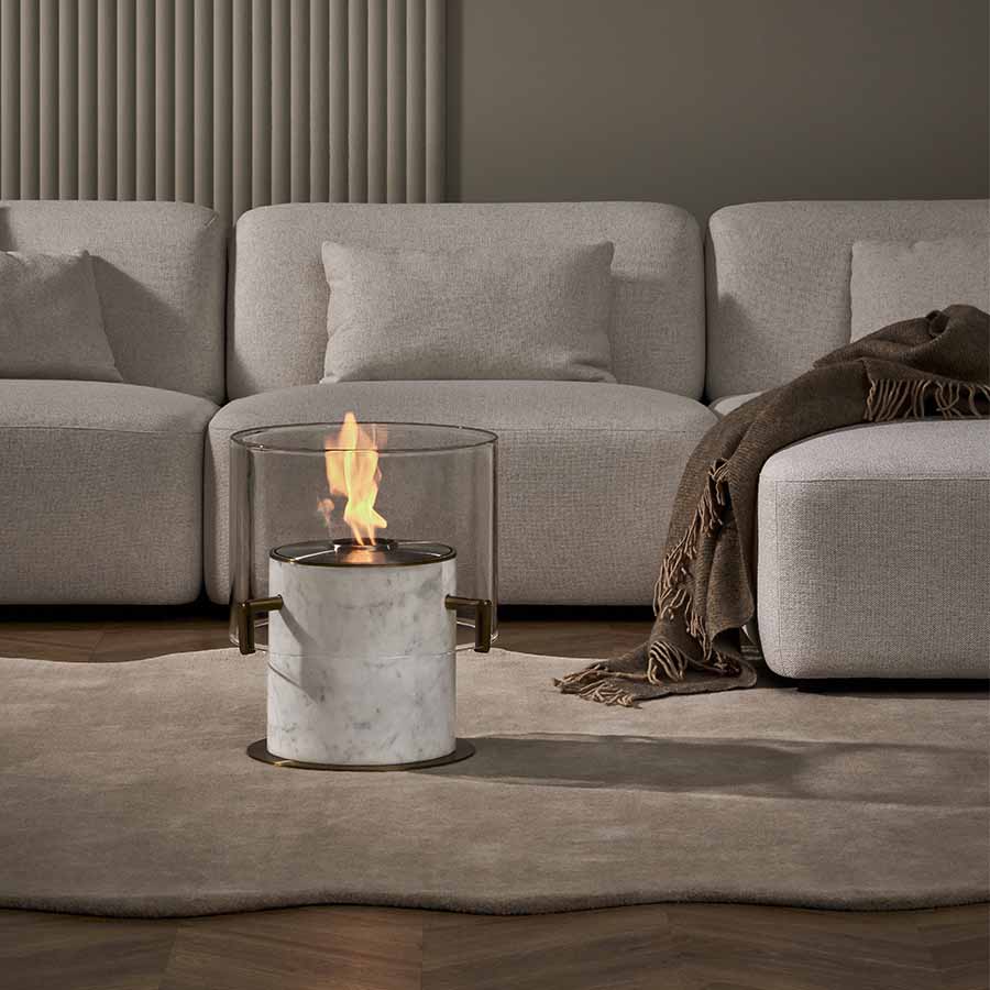 EcoSmart Fire Pillar 3L - Italian Carrara White Marble Finish In Lounge Setting